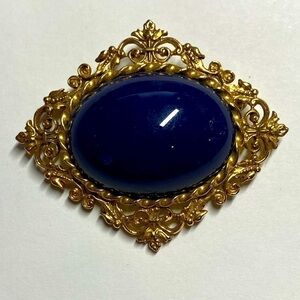 VINTAGE METAL BROOCH (item 126)